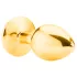 Sunfo - metalen buttplug met rode steen - goudkleurig